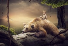 Photoshop合成森林中骑在熊上的小男孩图片